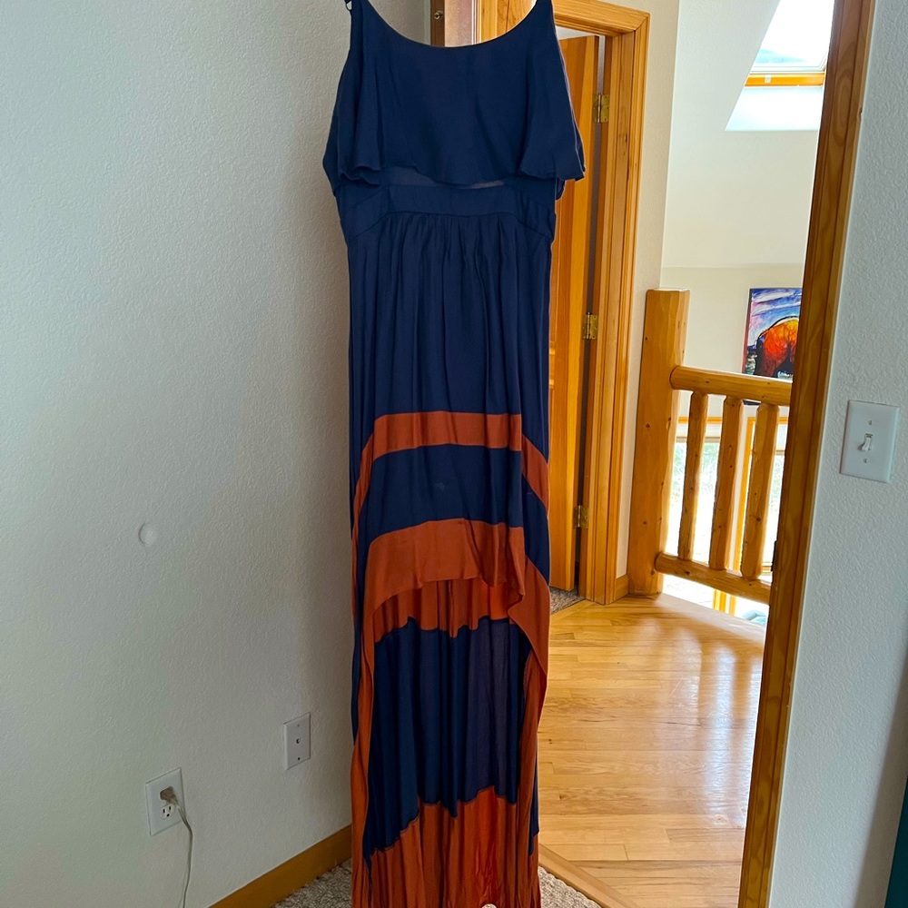 Sleeveless, DejaVu brand, zipper back, high-low dress.